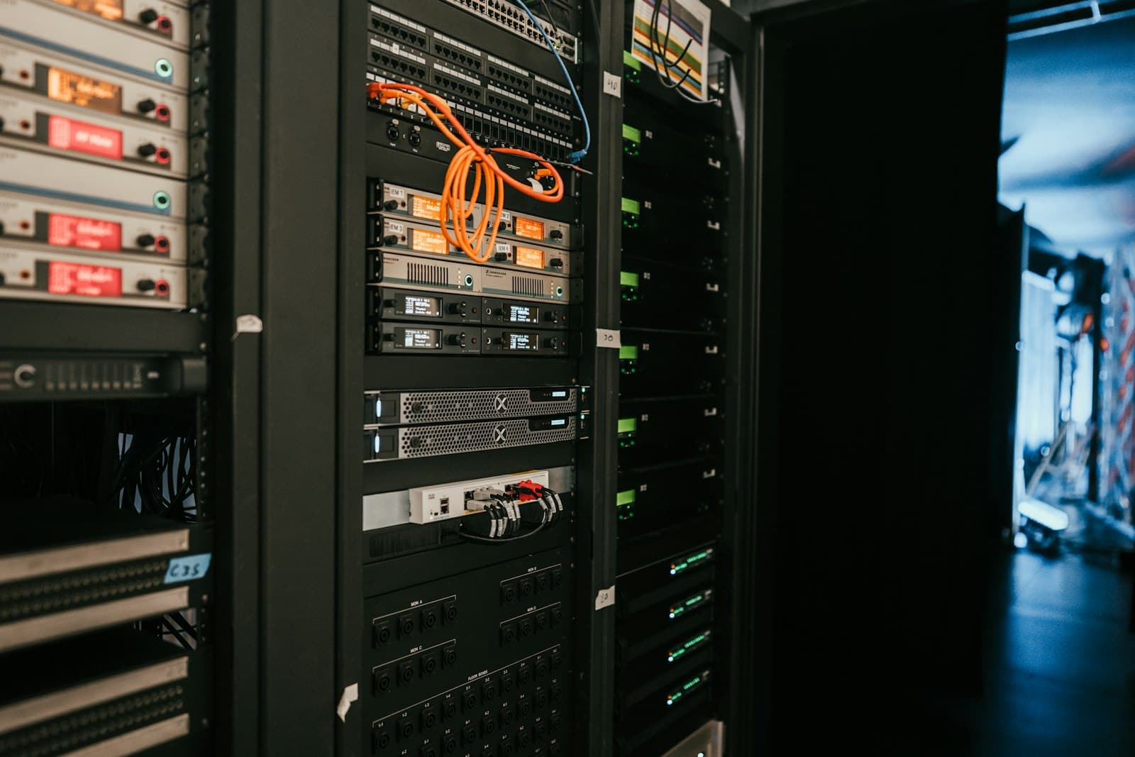 Rack-mounted servers, switches, and cabling at a deployment site
